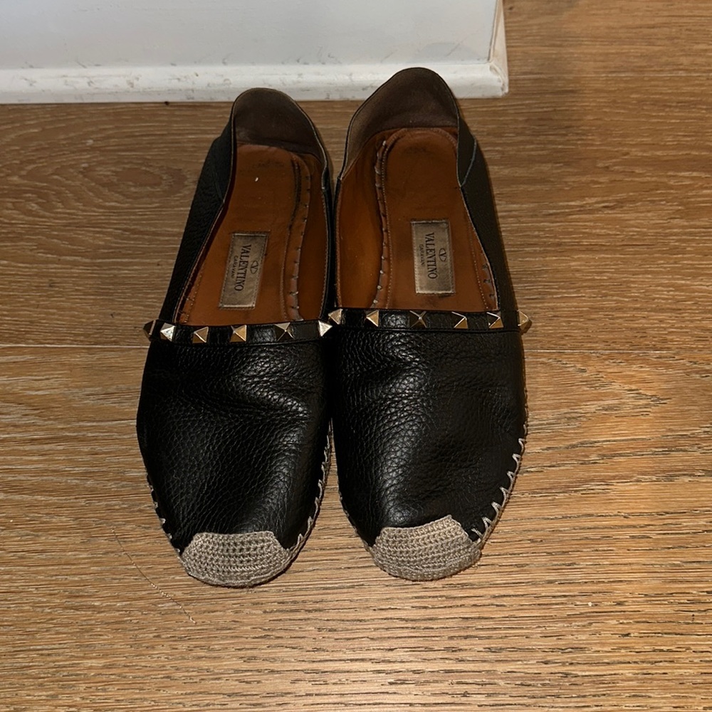Authentic Valentino flat espadrilles in black.